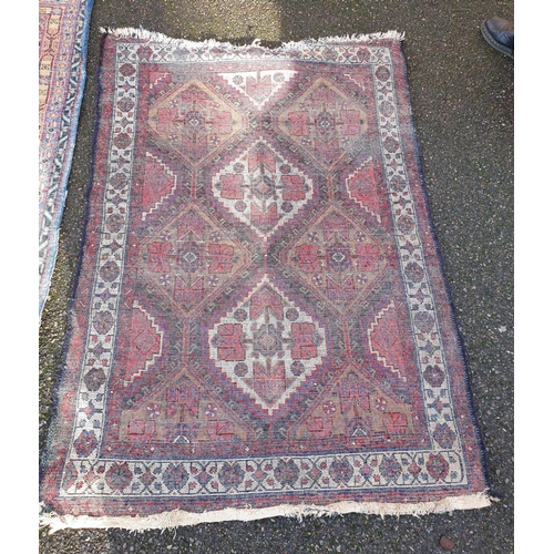 1002 - Three small rugs, 175 x 88.5cm; 147 x 80cm; and 150 x 107cm. (3)