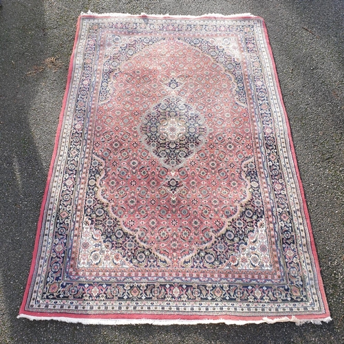 1004 - A Persian style carpet, 274 x 176cm.