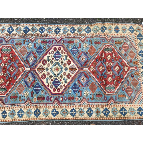 1009 - A Caucasian rug, 194 x 102.5cm.