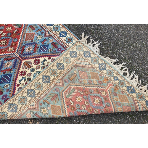 1009 - A Caucasian rug, 194 x 102.5cm.