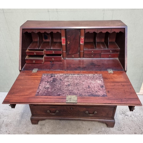 1024 - A George III mahogany bureau, 97cm wide.