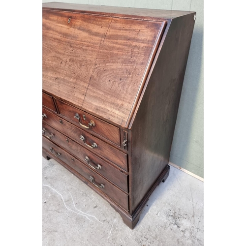 1024 - A George III mahogany bureau, 97cm wide.