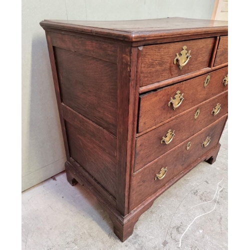 1026 - An 18th century oak panelled chest of drawers, 87cm wide.   ... 