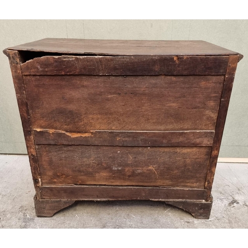 1026 - An 18th century oak panelled chest of drawers, 87cm wide.   ... 