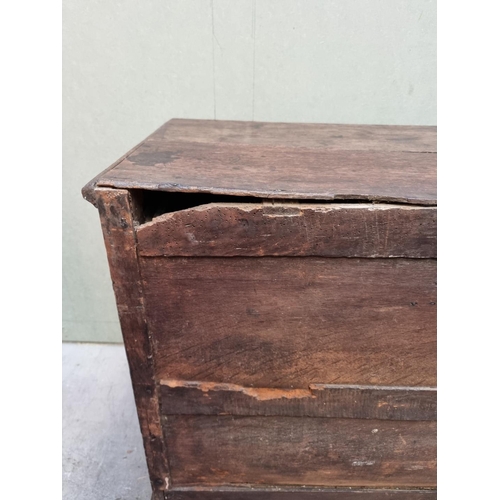 1026 - An 18th century oak panelled chest of drawers, 87cm wide.   ... 