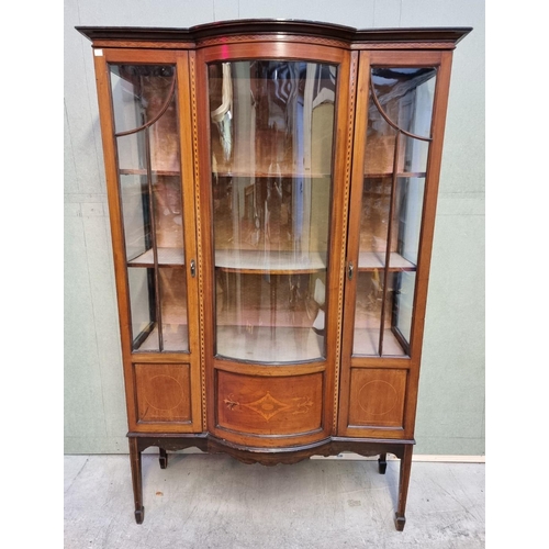 1028 - A circa 1900 mahogany and inlaid bowfront display cabinet, 114cm wide. 