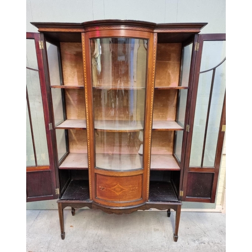 1028 - A circa 1900 mahogany and inlaid bowfront display cabinet, 114cm wide. 