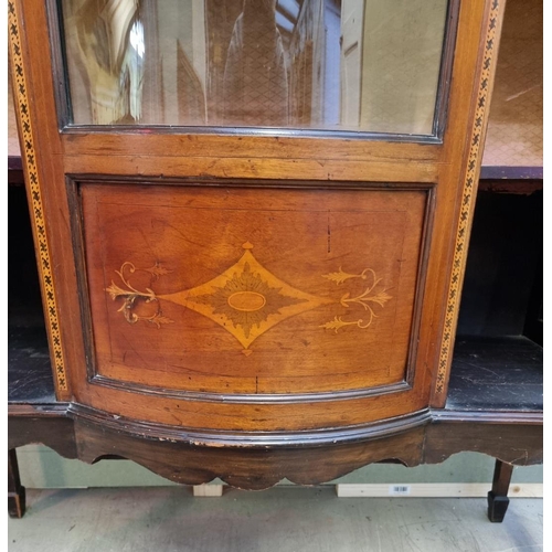 1028 - A circa 1900 mahogany and inlaid bowfront display cabinet, 114cm wide. 