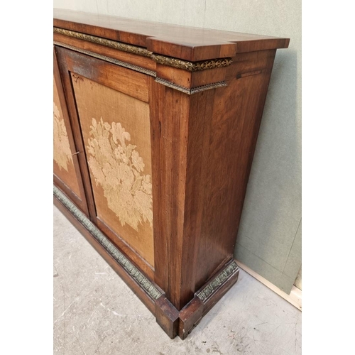 1030 - A George IV rosewood and gilt brass side cabinet, with fabric panel doors, 132.5cm wide.... 