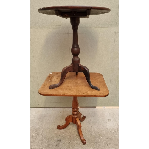 1034 - Two mahogany tilt-top tripod tables, comprising: a George III circular example, 60cm diameter; and a... 