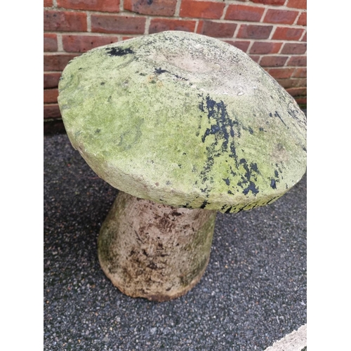 1041 - A pair of antique sandstone staddle stones, 73cm high.