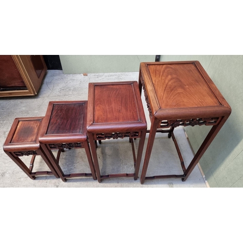 1053 - A set of four Chinese carved hardwood quartetto tables, largest 46cm wide.