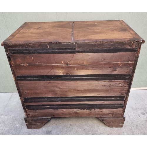 1055 - An 18th century walnut, feather and crossbanded chest of drawers, 94.5cm wide.