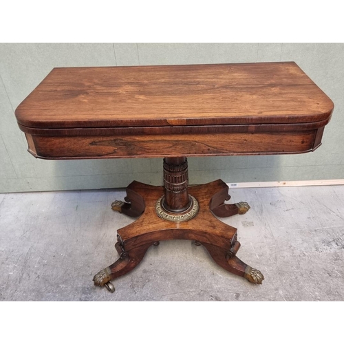 1057 - A William IV rosewood pedestal card table, with unusual brass push button lock mechanism, 91cm ... 