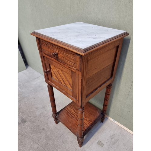 1059 - A Victorian pitch pine and marble top pot cupboard, 39.5cm wide. 