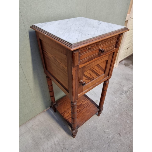 1059 - A Victorian pitch pine and marble top pot cupboard, 39.5cm wide. 