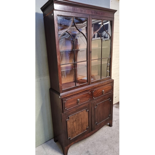 1068 - A Regency mahogany secretaire bookcase, 124cm wide.