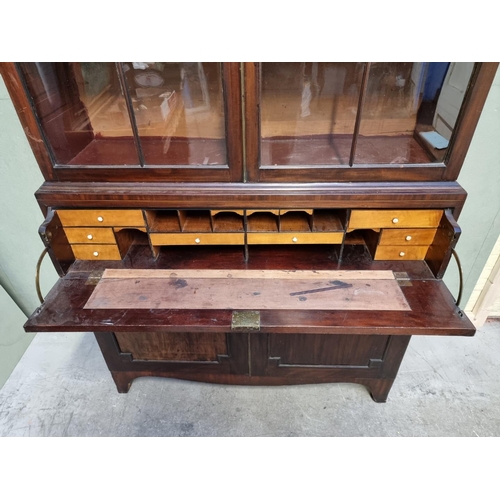 1068 - A Regency mahogany secretaire bookcase, 124cm wide.