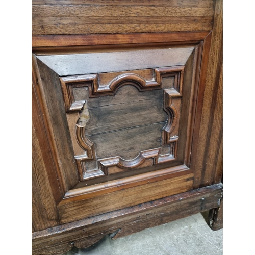 1070 - An antique Continental walnut and oak side cabinet, with moulded decoration, 119cm wide.... 