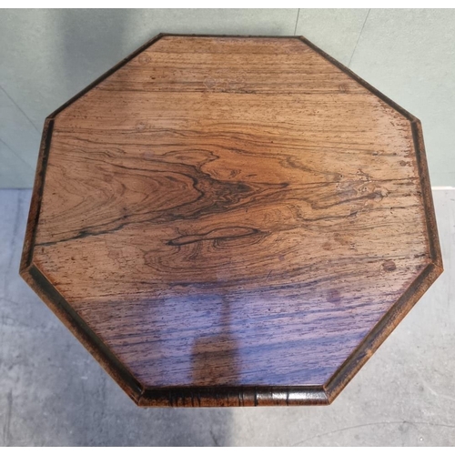 1073 - A Victorian rosewood octagonal trumpet form work table, 43cm wide.