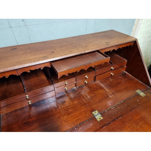 1076 - A George III mahogany bureau, 102cm wide. 