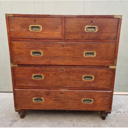 1077 - An antique teak and brass bound campaign chest, labelled 'Manufactured by S W Silver & Co,...Lon... 