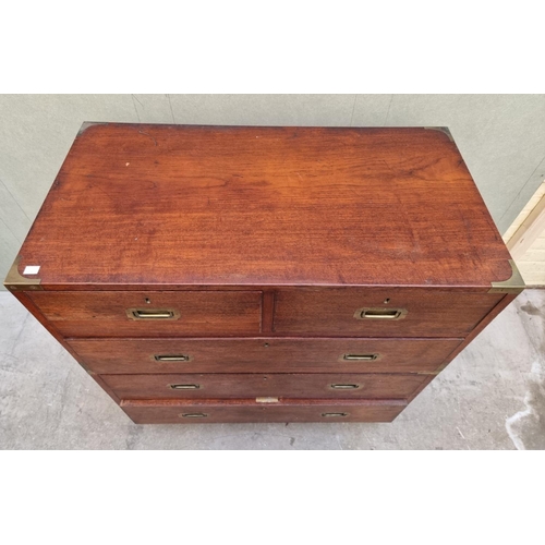 1077 - An antique teak and brass bound campaign chest, labelled 'Manufactured by S W Silver & Co,...Lon... 