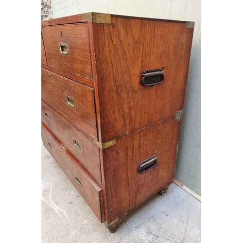 1077 - An antique teak and brass bound campaign chest, labelled 'Manufactured by S W Silver & Co,...Lon... 