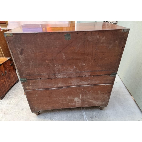 1077 - An antique teak and brass bound campaign chest, labelled 'Manufactured by S W Silver & Co,...Lon... 