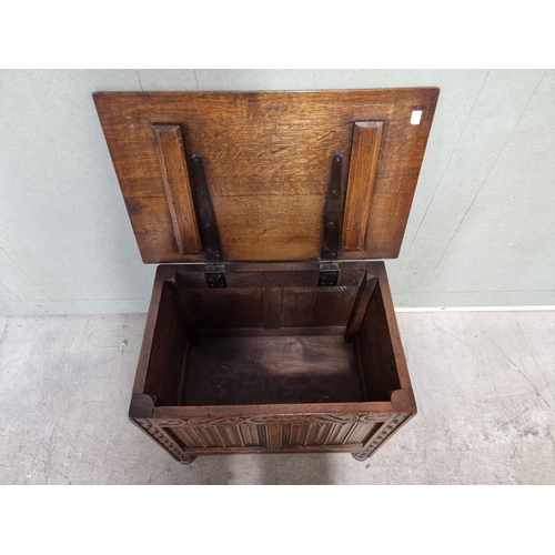 1078 - A small 'Ipswich Oak' carved linenfold coffer, 61cm wide.