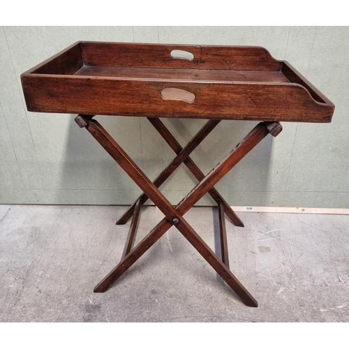 1097 - A George III mahogany butler's tray, 78cm wide, on folding stand.