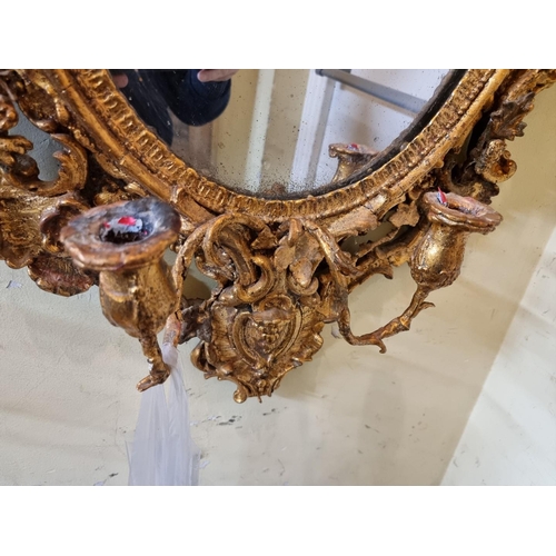 1105 - Two antique giltwood framed girandoles, largest 100 x 56cm.