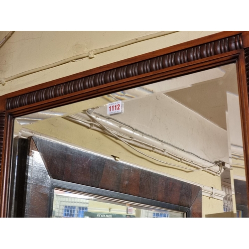 1111 - A 19th century rosewood framed rectangular wall mirror, 67 x 98.5cm. 