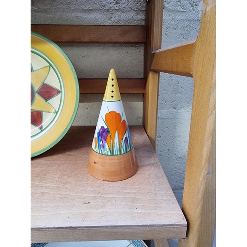 1119 - A Clarice Cliff 'Crocus' pattern conical sugar caster, 14cm high; together with another Clarice Clif... 