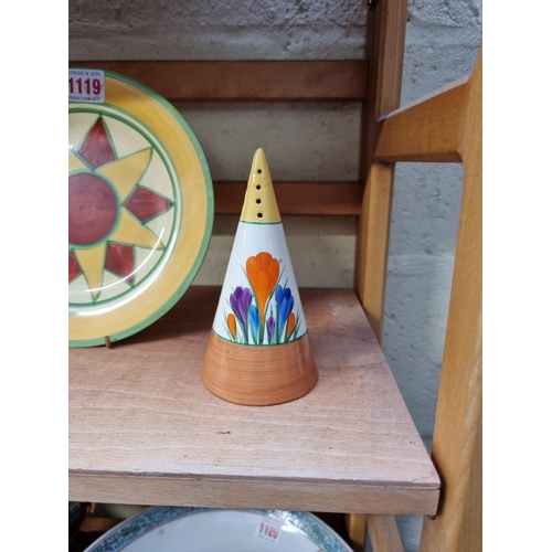 1119 - A Clarice Cliff 'Crocus' pattern conical sugar caster, 14cm high; together with another Clarice Clif... 