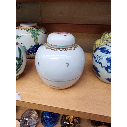 1131 - Eight Chinese ginger jars, two with covers, largest 13cm. 