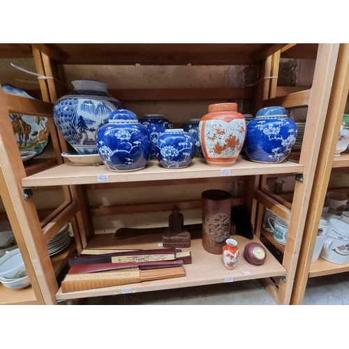 1133 - A mixed group of Oriental items, to include Chinese ginger jars; bamboo fans; and a brush pot, 20cm ... 