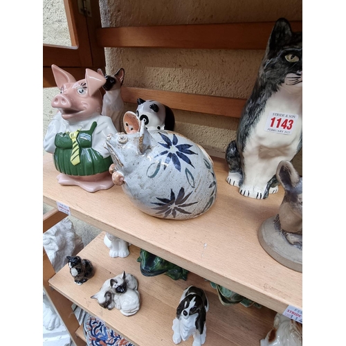 1143 - A collection of pottery animals, to include examples by Lomonosov; Beswick; Royal Doulton; Rye etc. ... 