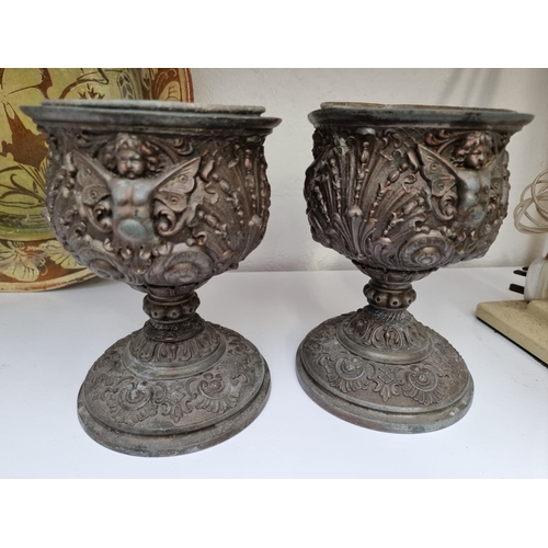 1160 - A pair of spelter pedestal jardinieres, 21cm high.... 