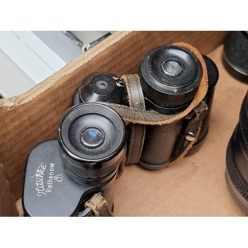 1176 - A small group of binoculars, cameras and related, to include a pair of Ross military binoculars; and... 