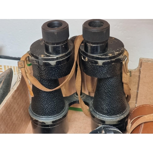 1176 - A small group of binoculars, cameras and related, to include a pair of Ross military binoculars; and... 