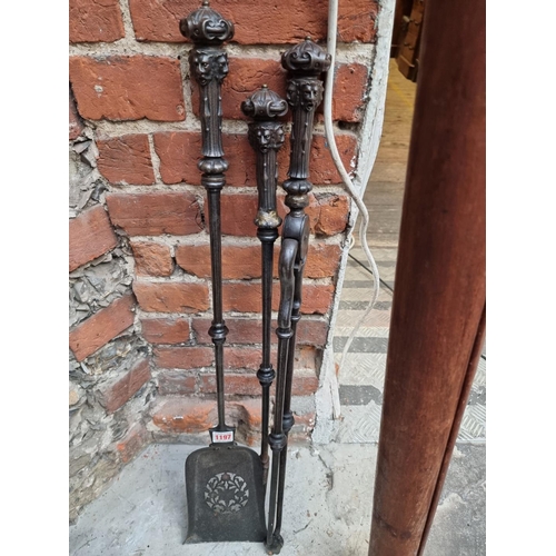 1197 - A set of three 19th century steel fire irons, (two a.f.).