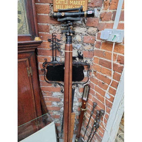 1199 - A theodolite, by Norton & Gregory Ltd, on large tripod. 