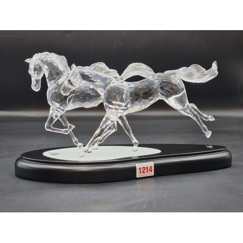 1214 - Swarovski: 'The Wild Horses' figure group, number 25/10,000, boxed with stand, certificate etc.... 