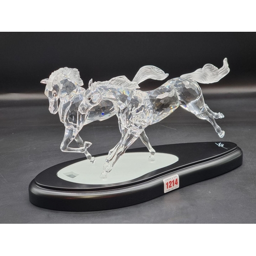 1214 - Swarovski: 'The Wild Horses' figure group, number 25/10,000, boxed with stand, certificate etc.... 