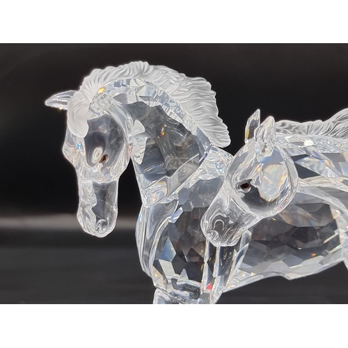 1214 - Swarovski: 'The Wild Horses' figure group, number 25/10,000, boxed with stand, certificate etc.... 