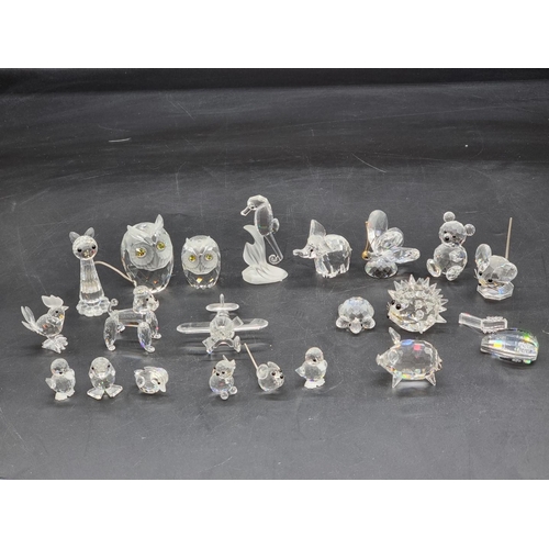 1226 - Swarovski: a collection of animals, to include a seahorse, 8cm high; and an owl; together with an ae... 