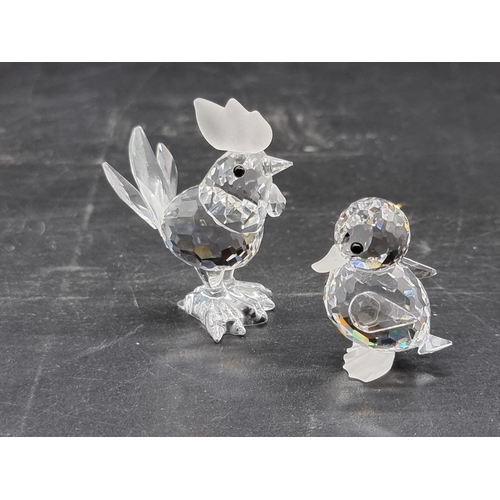 1235 - Swarovski: eighteen birds, to include a Falcon head (small), each boxed. (18)