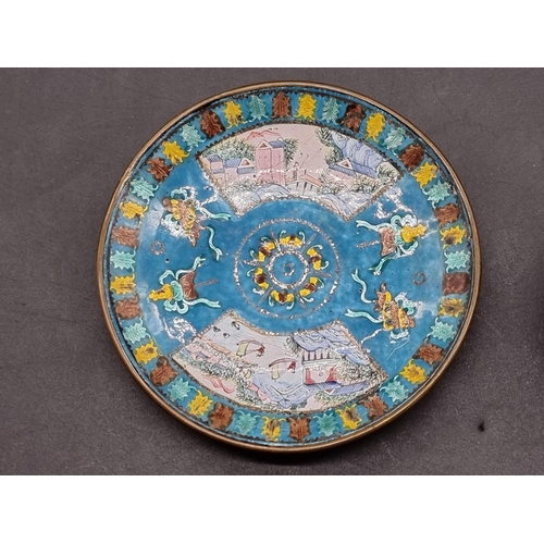 1254 - A small Chinese canton enamel wine bowl and saucer, 18th century, painted with landscape panels... 