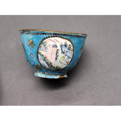 1254 - A small Chinese canton enamel wine bowl and saucer, 18th century, painted with landscape panels... 